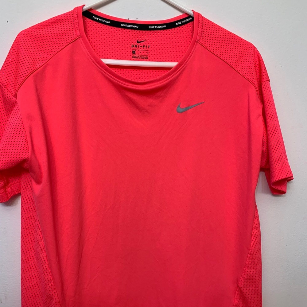 Pink Nike shirt